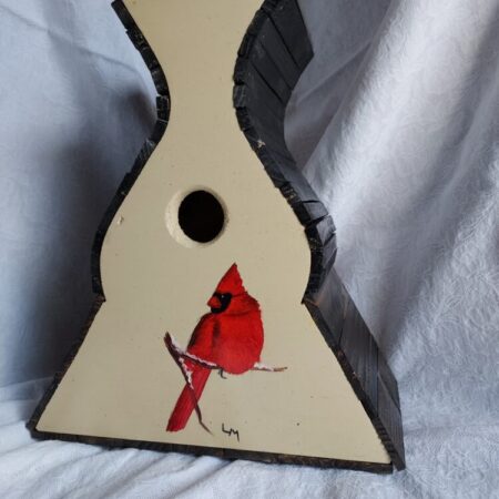 Birdhouse with a red Northern cardinal painted on the front with grey background